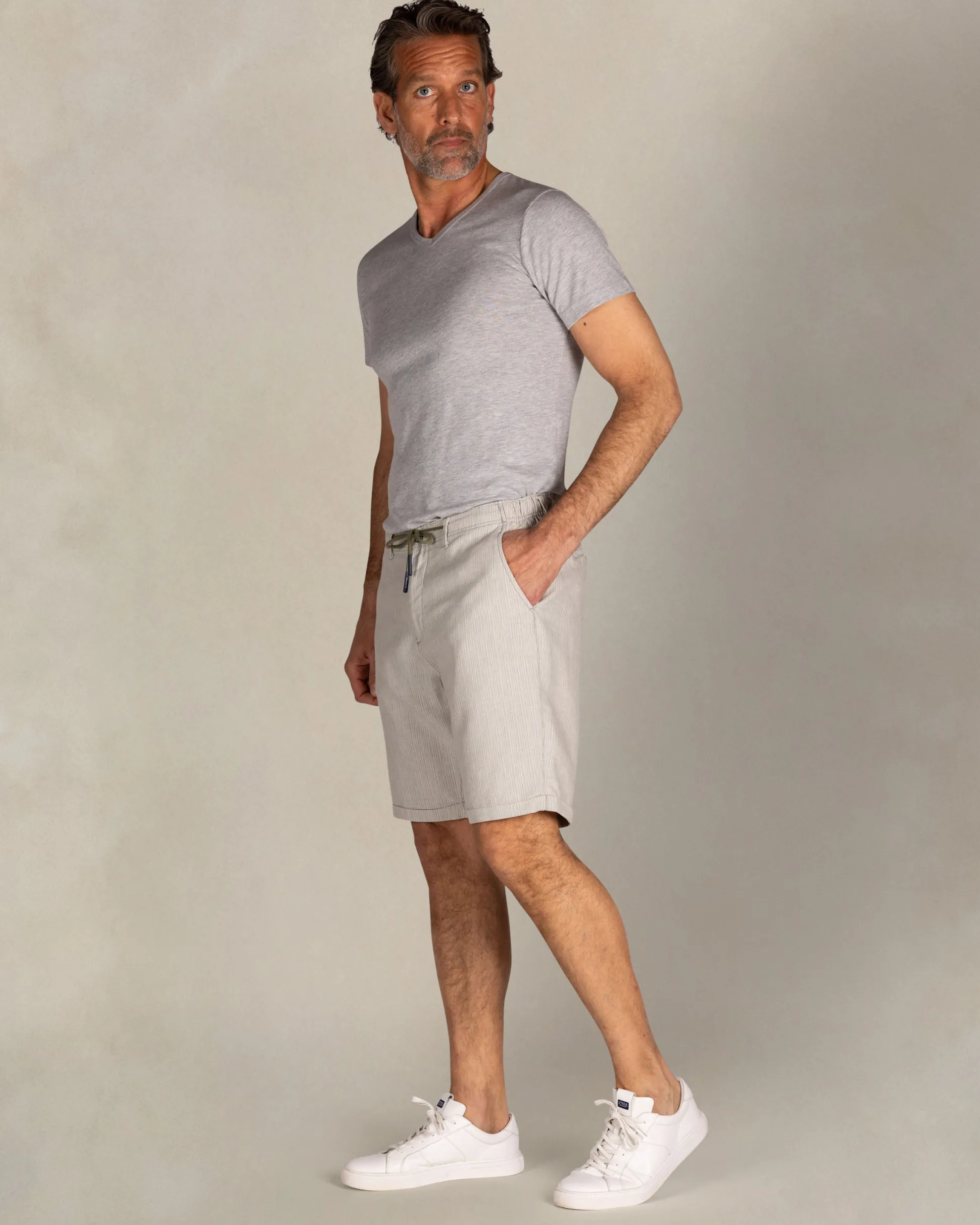 Beige linen striped shorts