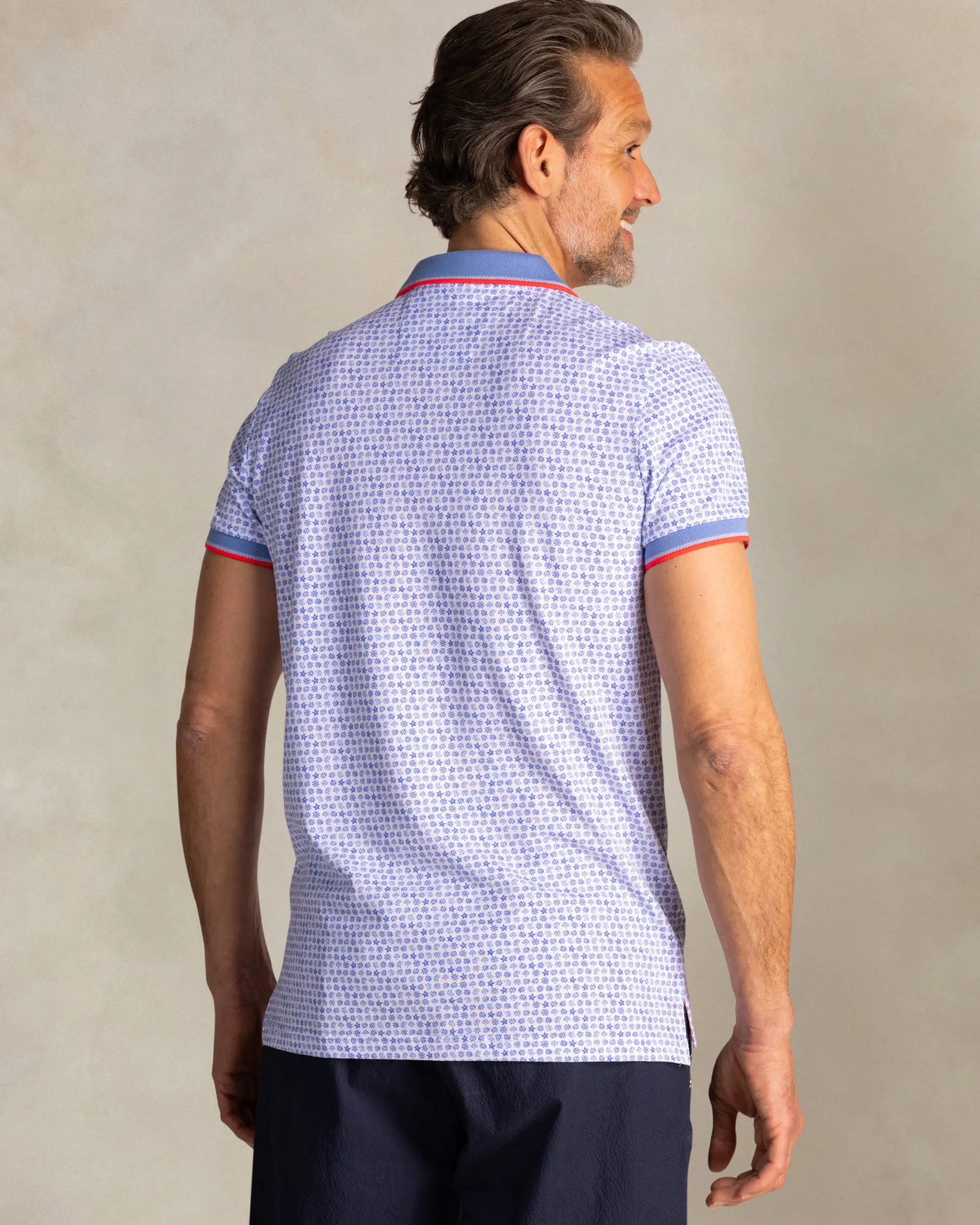Blue cotton polo with graphic print