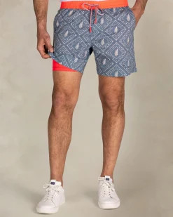 Blue printed swim shorts with red trim
