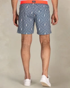 Blue printed swim shorts with red trim