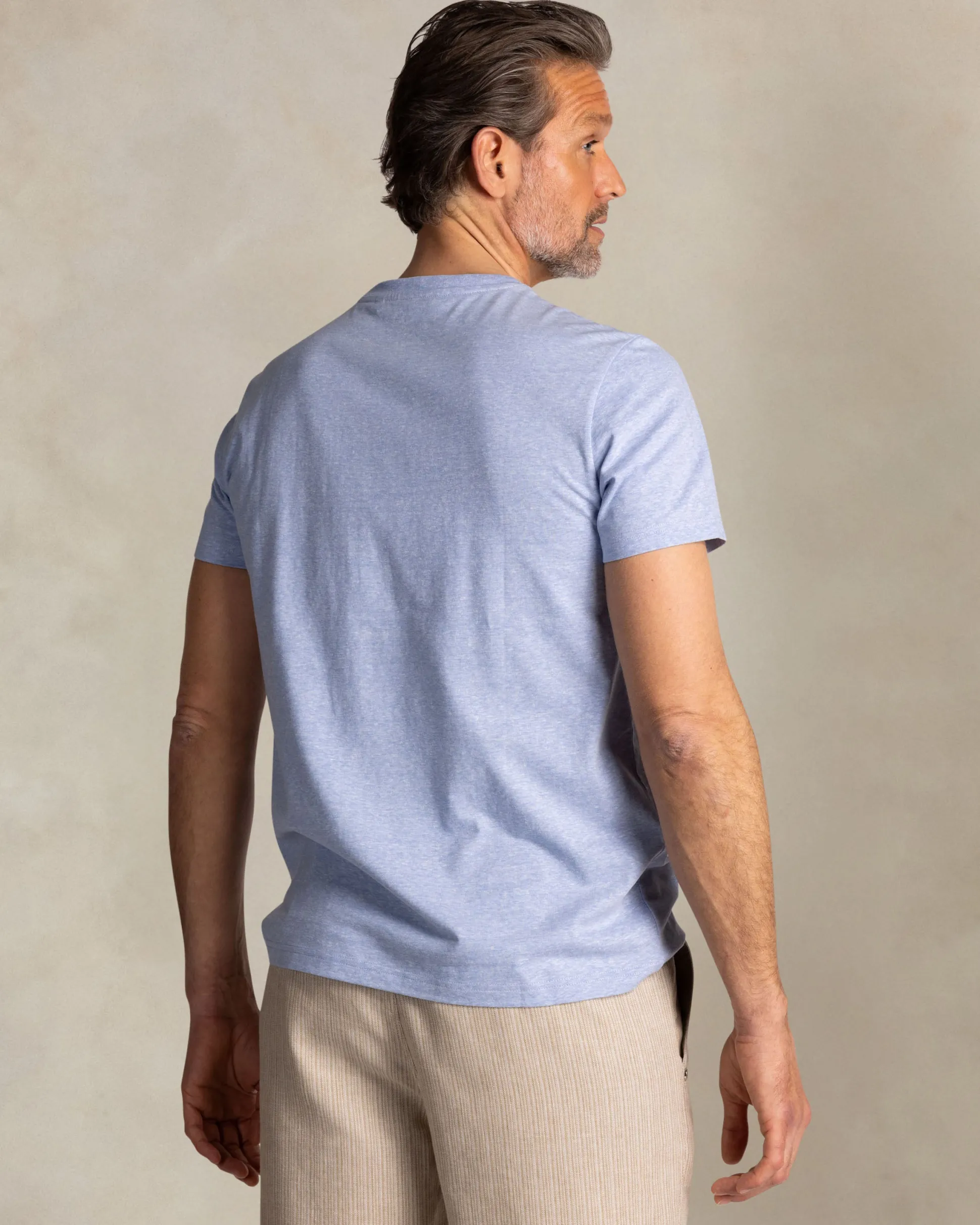 Blue T-shirt with NZA logo on the chest