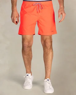 Bright red swim shorts with navy details