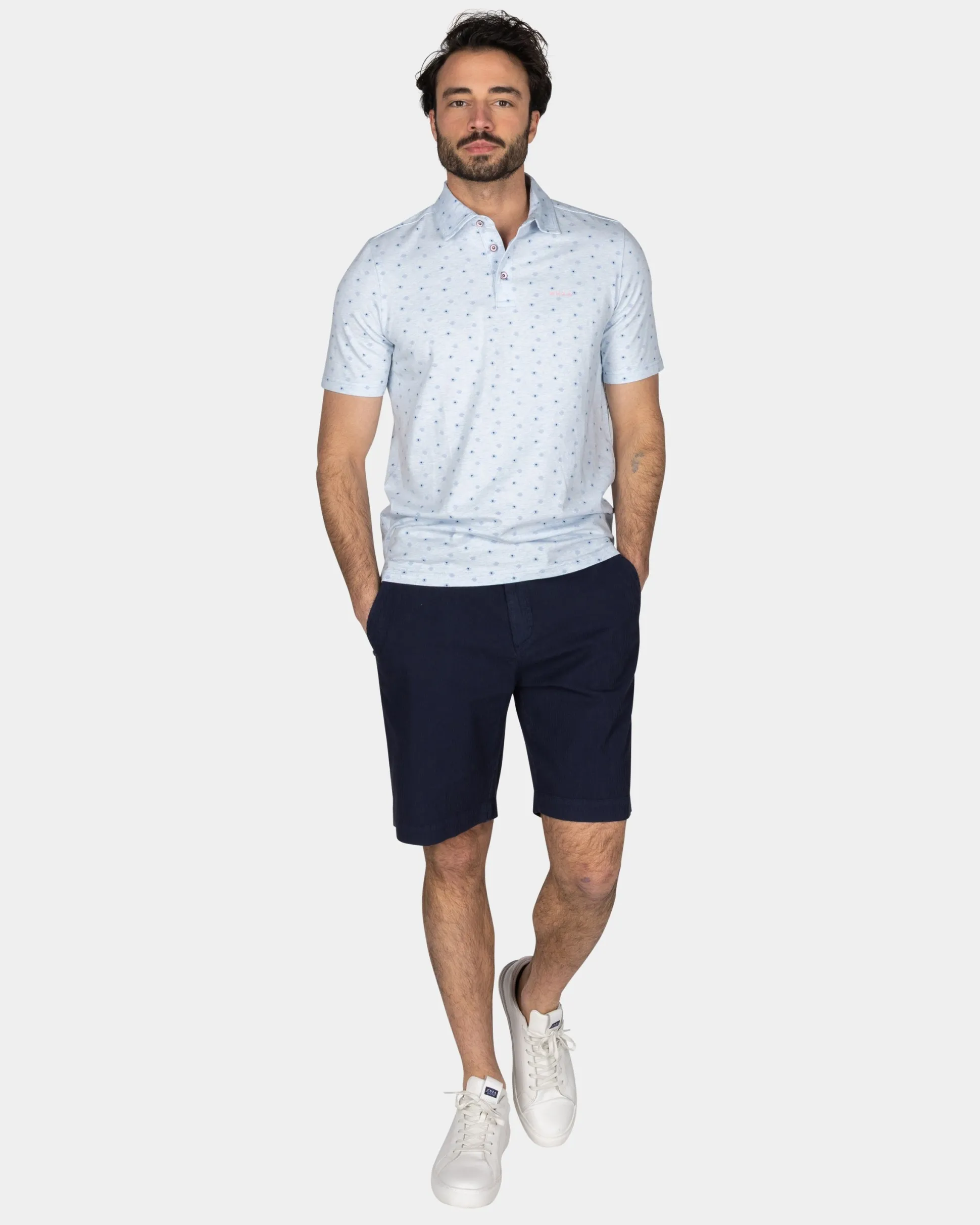 Cotton Pastel Blue Polo with a print of small polka dots