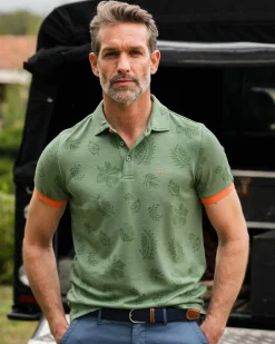 Green polo shirt with leaf print