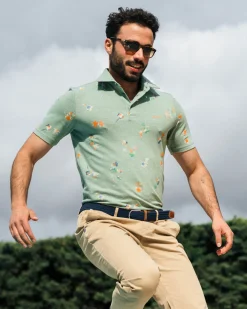Green polo shirt with leaf print
