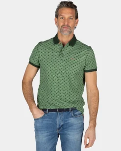 Green polo with dots