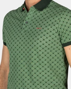 Green polo with dots