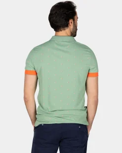 Green polo with orange accents