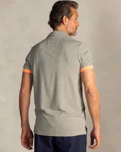 Green polo with orange details