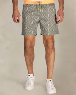 Green printed swim shorts with orange trim