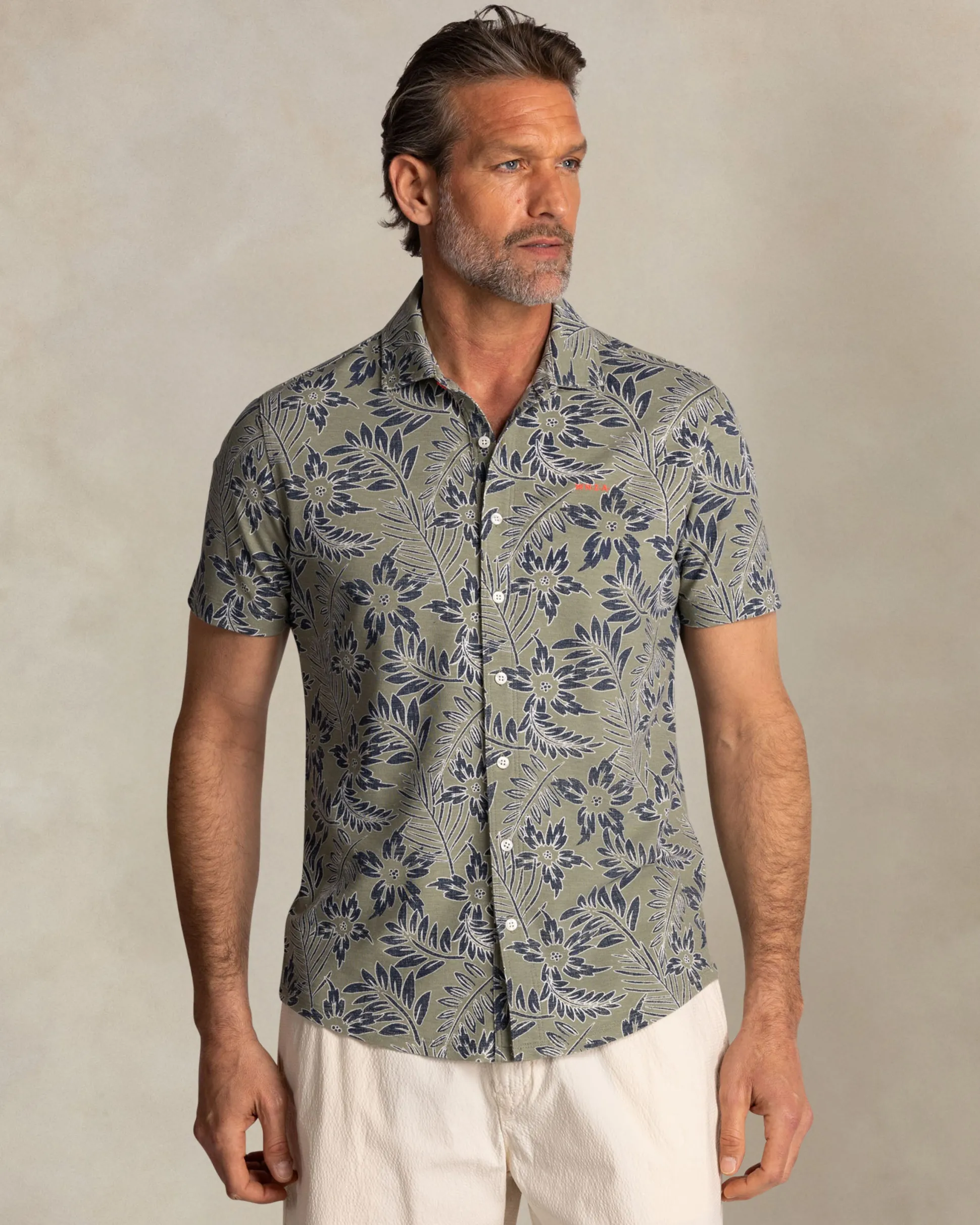 Green shirt with blue and white leaf print