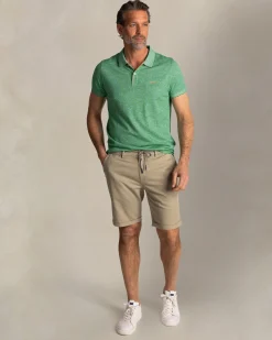 Green solid polo made of cotton and linen