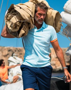 Light blue polo with leaf print