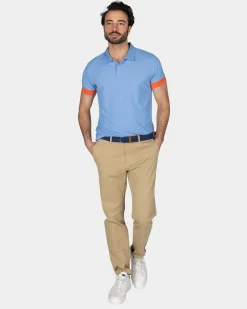 Light blue polo with orange accents