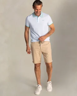 Light blue polo with striped collar