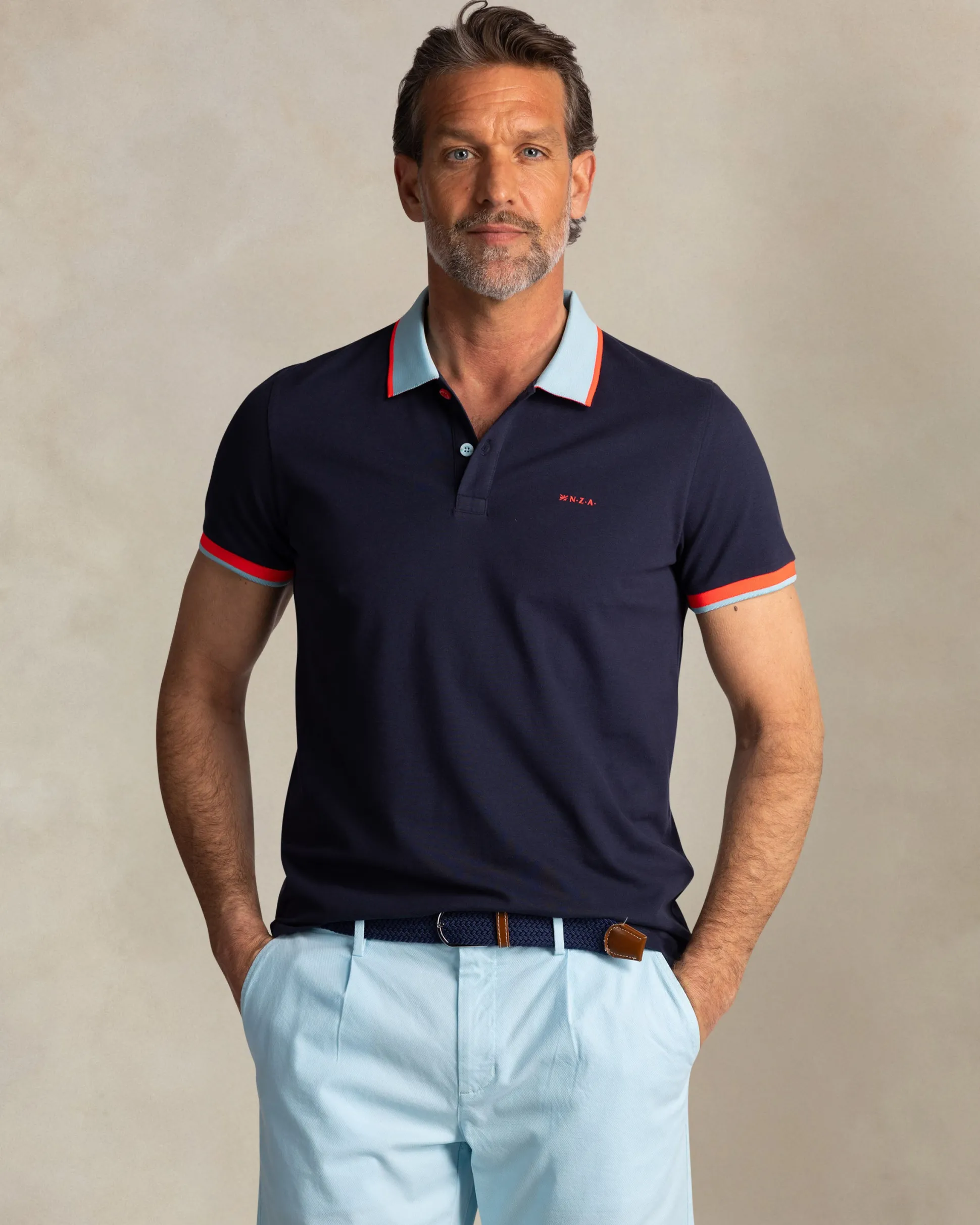 Navy cotton polo with light blue collar