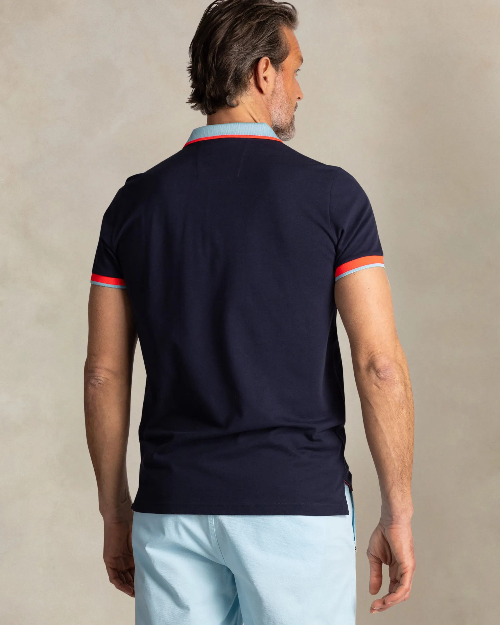 Navy cotton polo with light blue collar