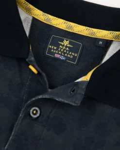 Navy polo shirt with leaf print