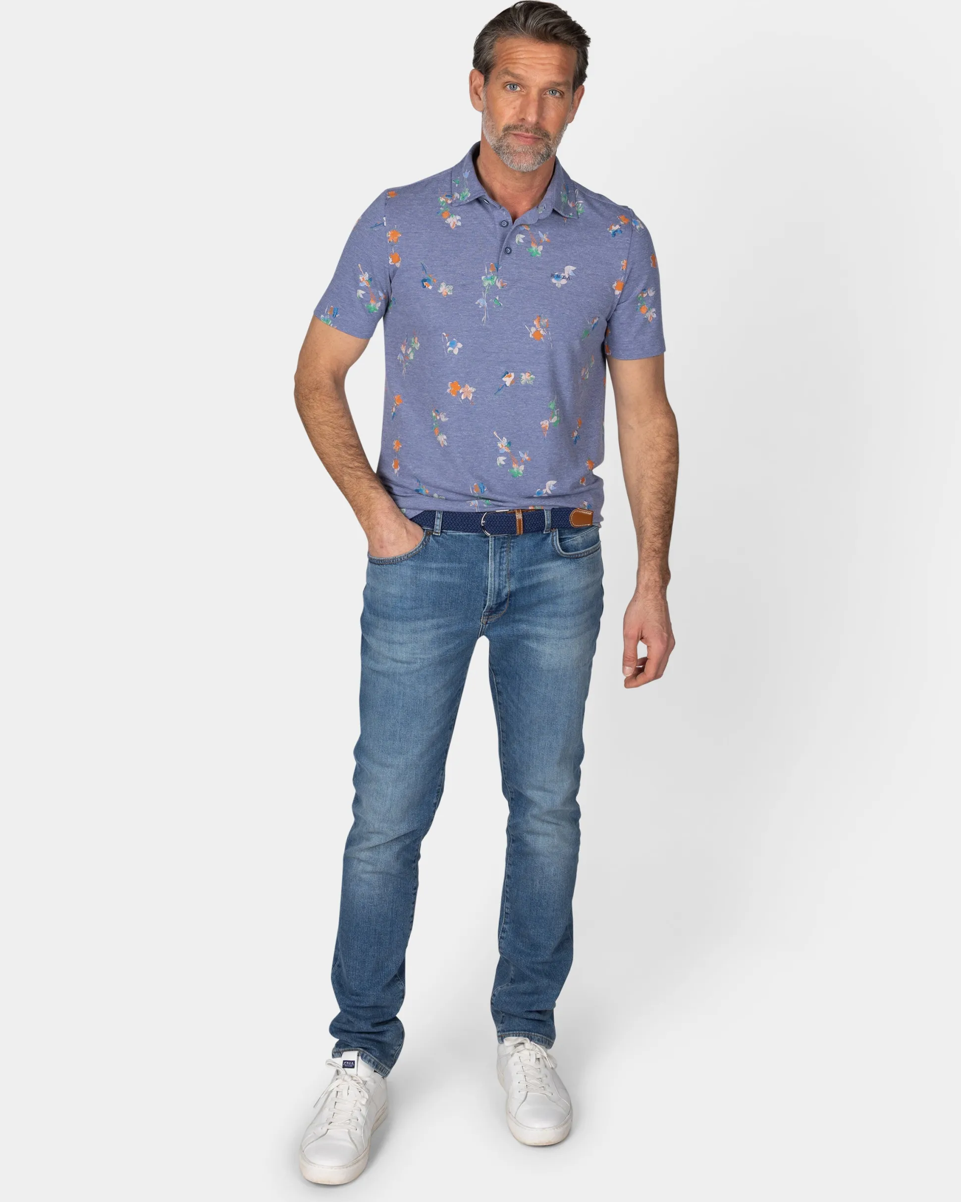 Navy polo shirt with leaf print