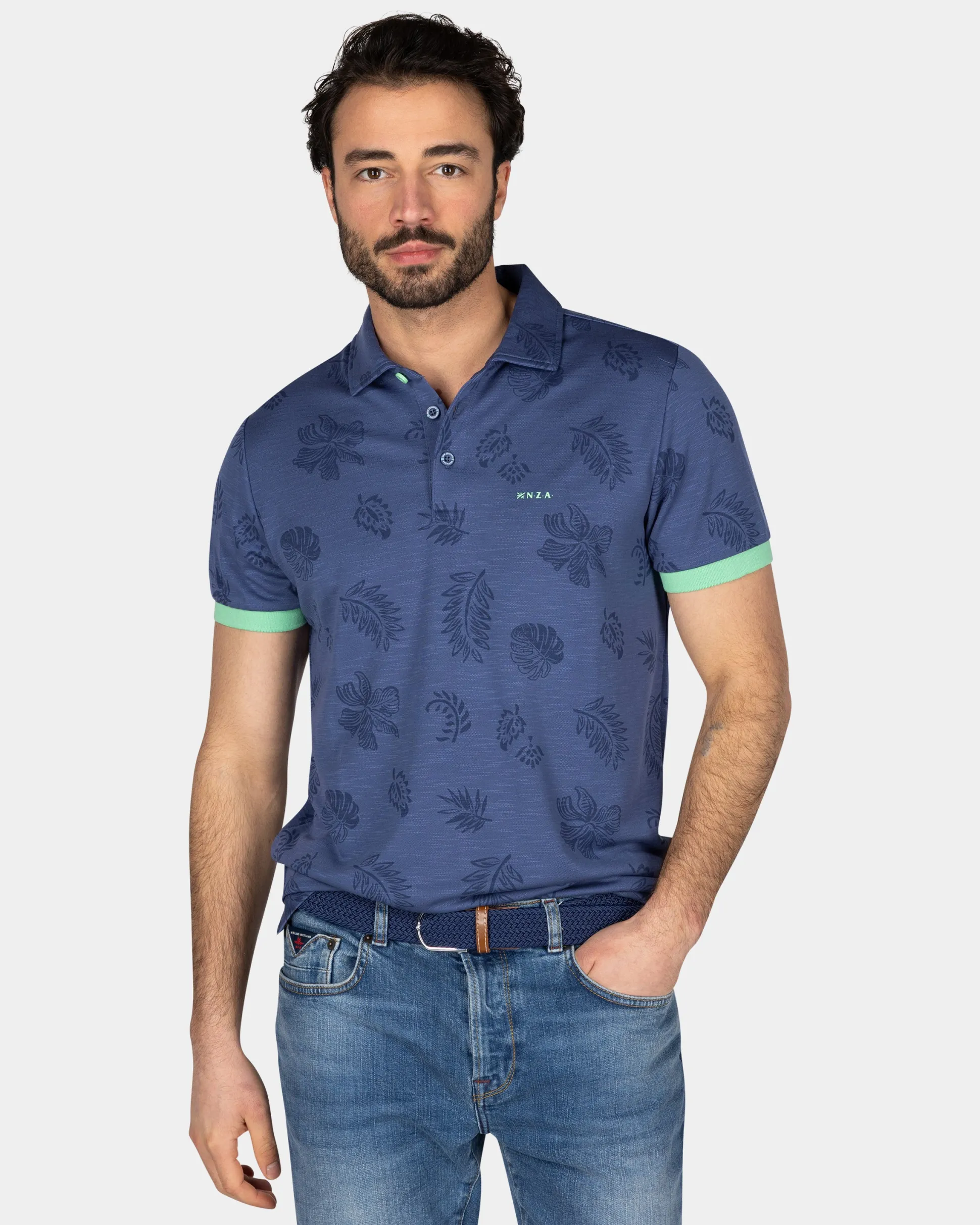 Navy polo shirt with leaf print