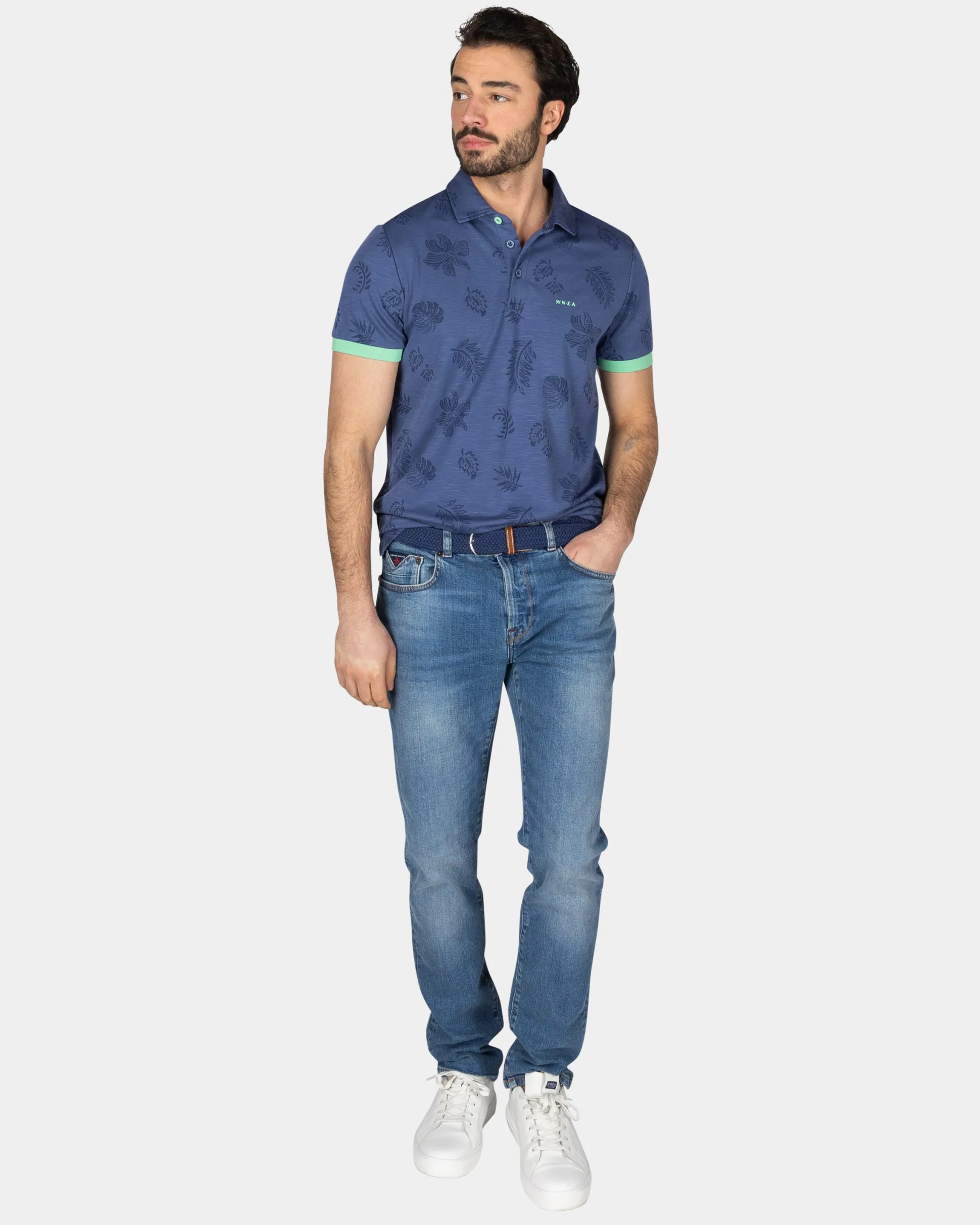 Navy polo shirt with leaf print