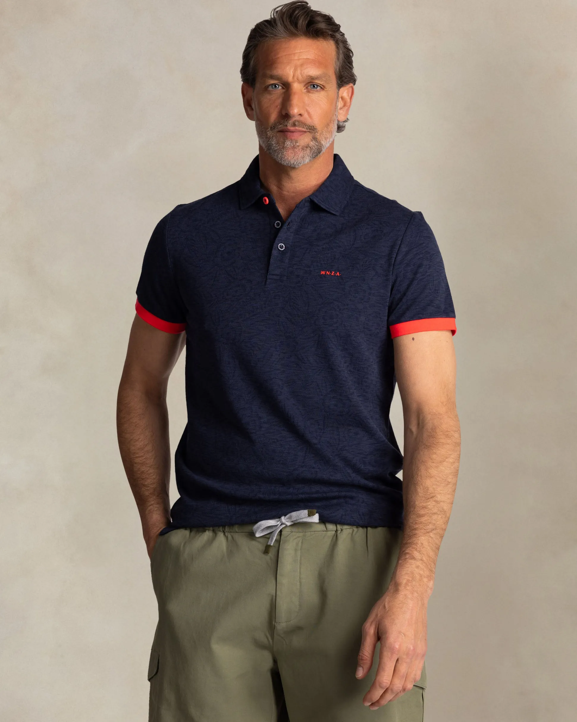 Navy polo with leaf print