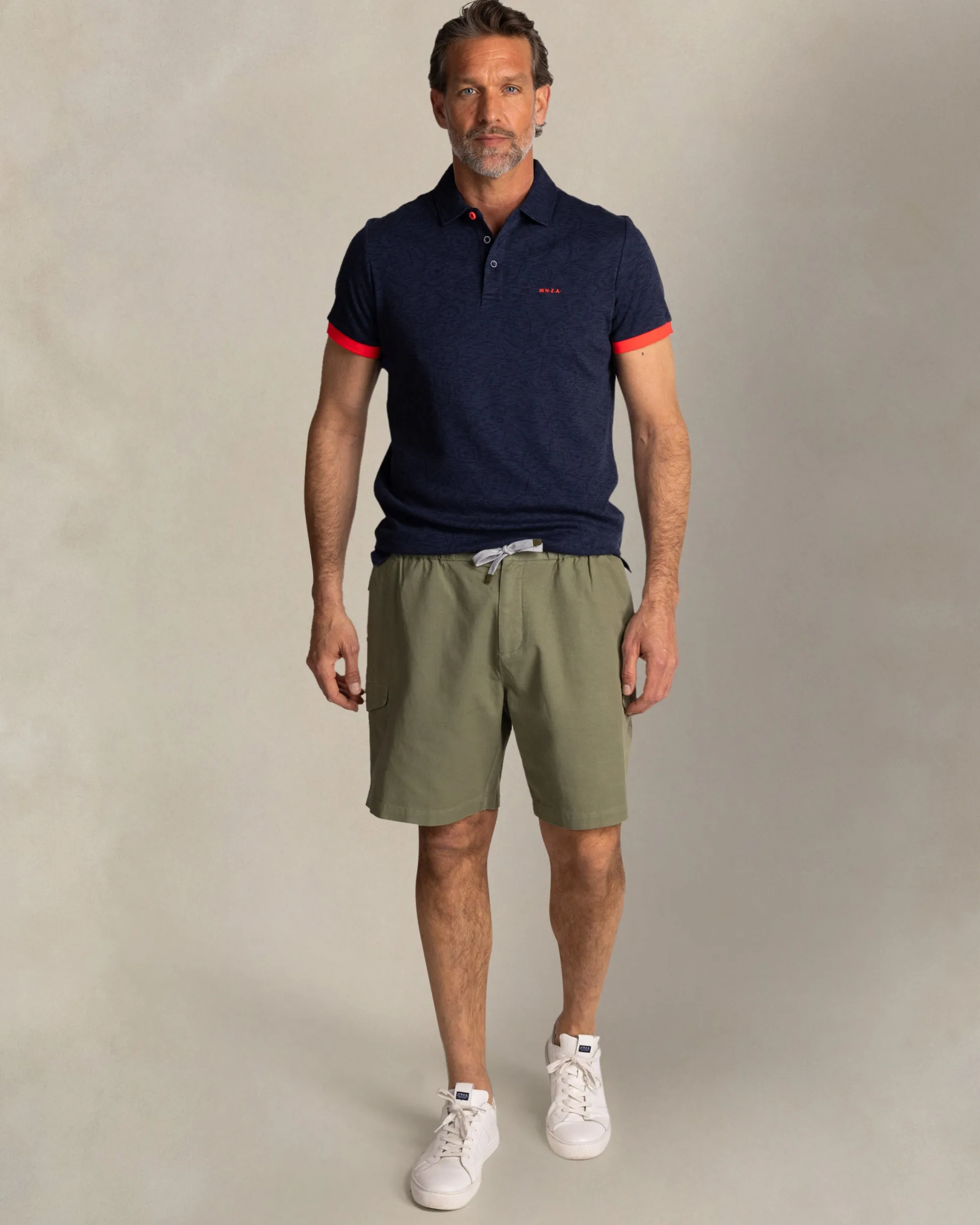 Navy polo with leaf print