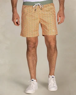 Orange printed swim shorts with green trim
