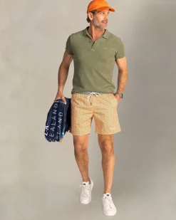 Orange printed swim shorts with green trim