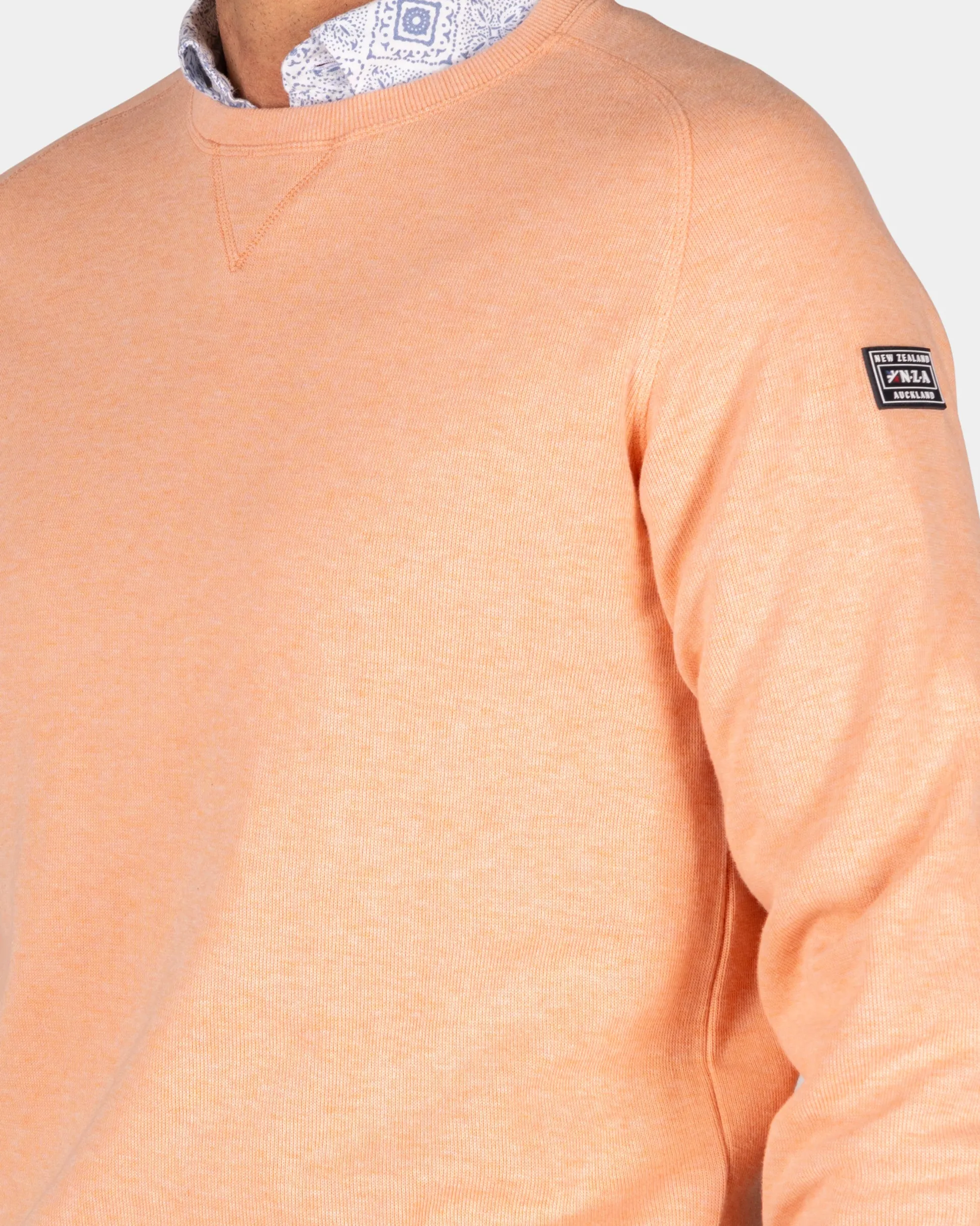 Peach pullover with round neck