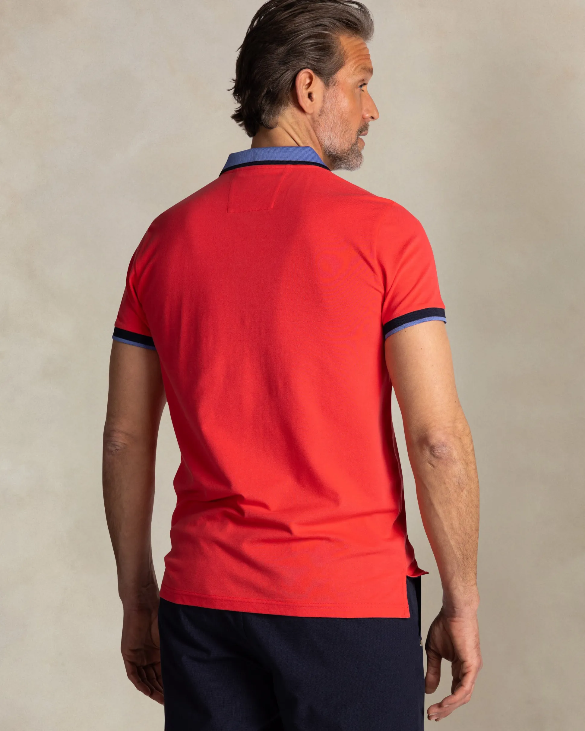 Red cotton polo with blue collar