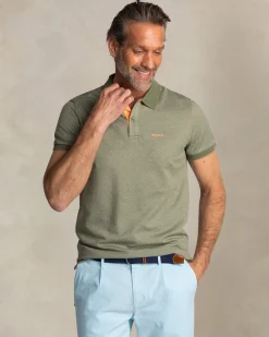 Solid green polo with orange details