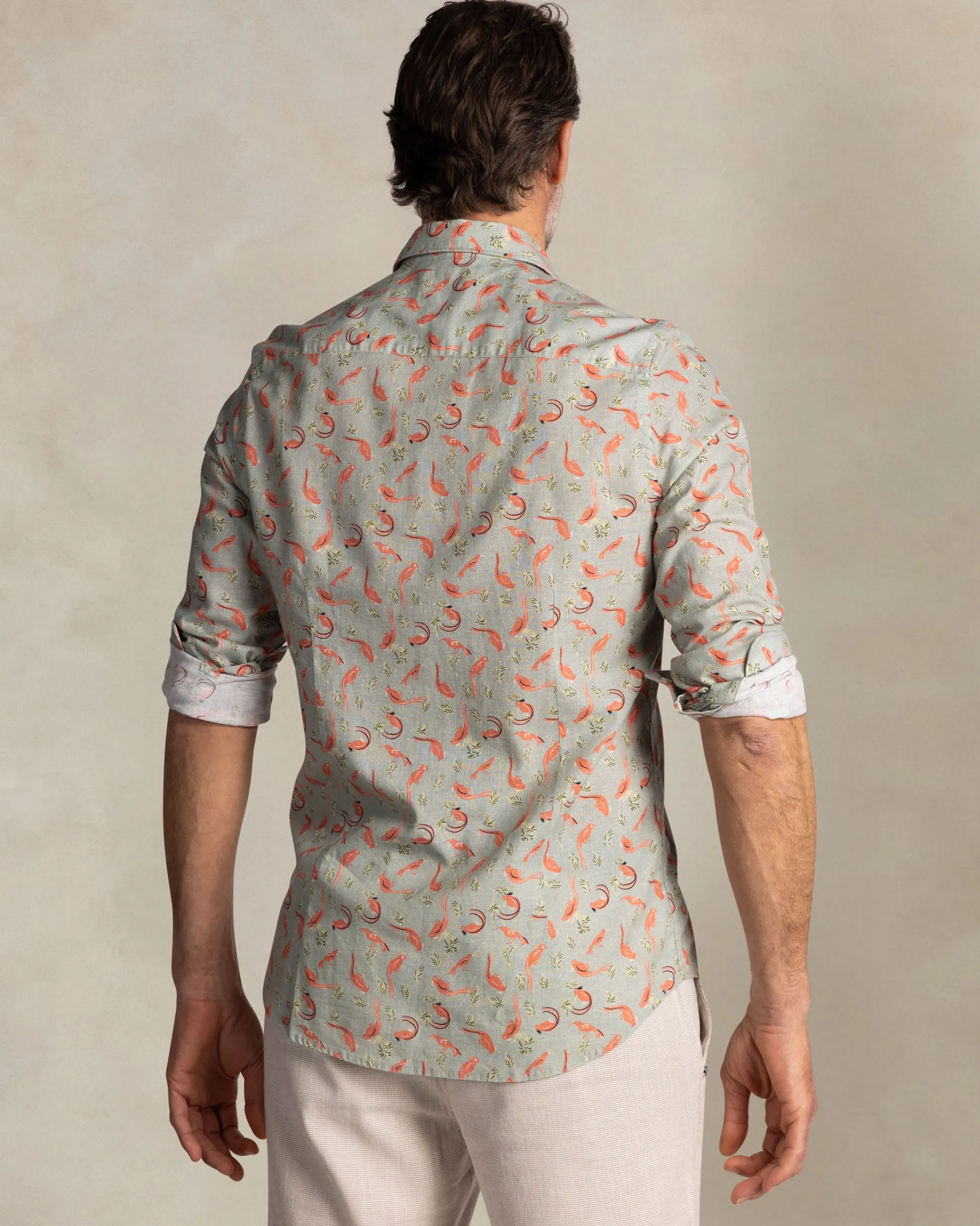 Taupe shirt with orange graphic print