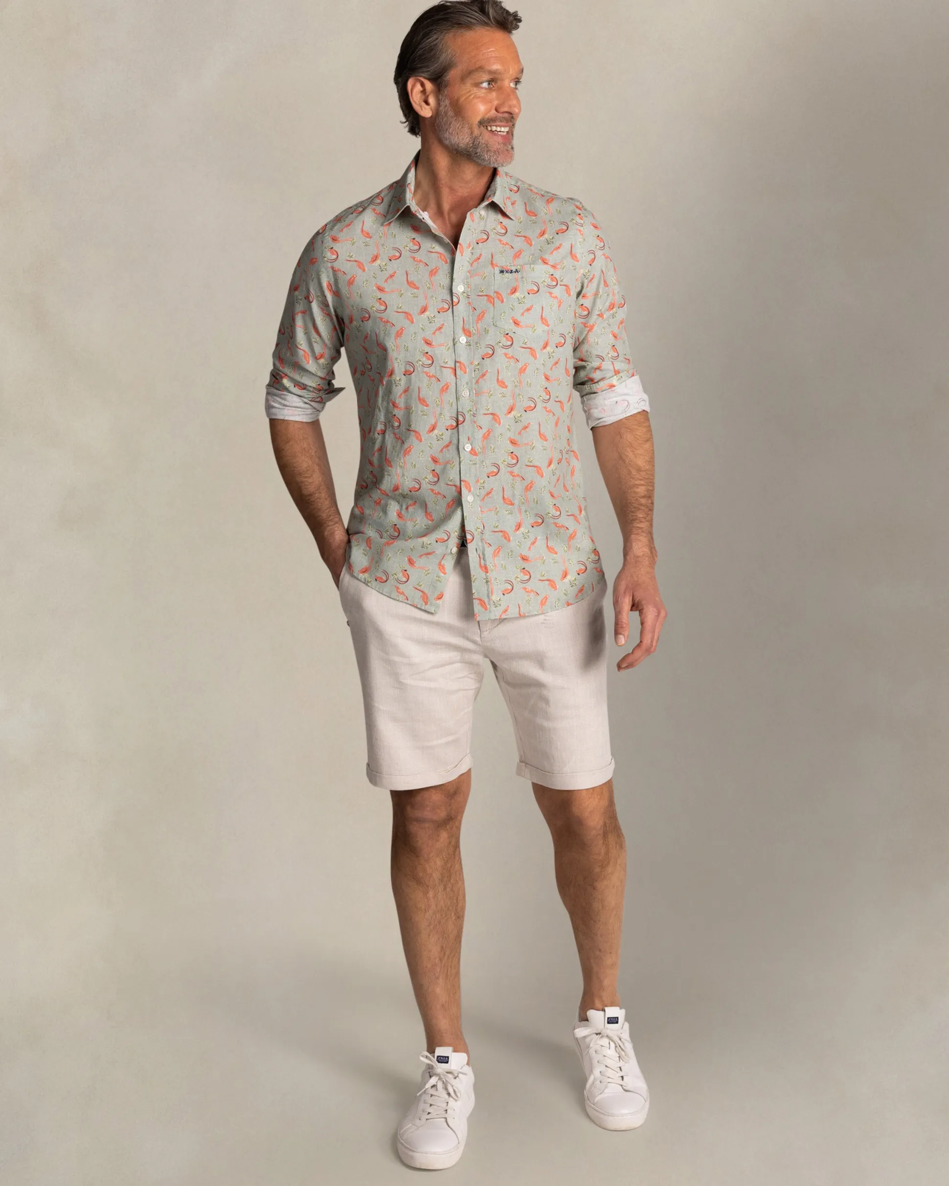 Taupe shirt with orange graphic print