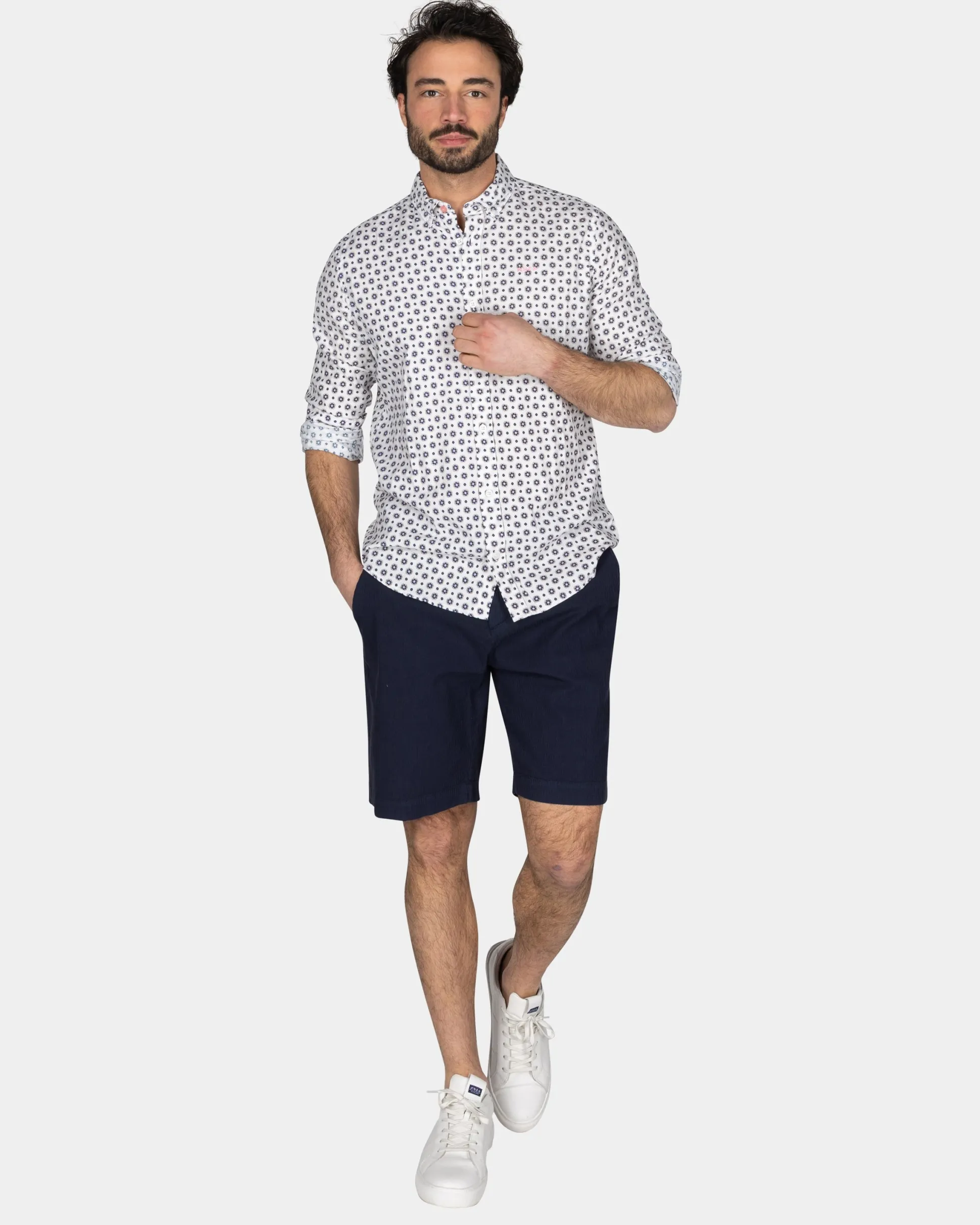 White Shirt with Blue Graphic Print