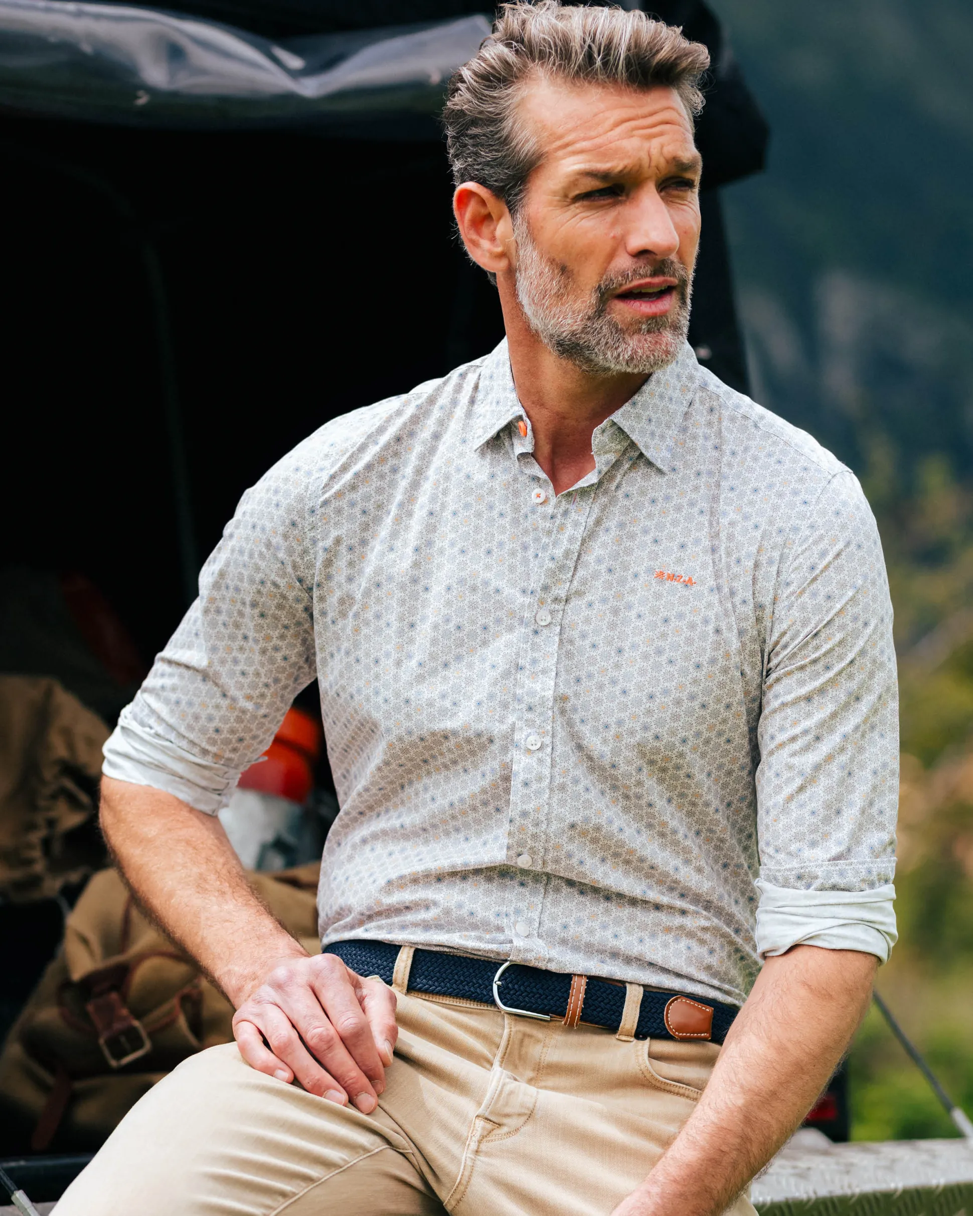 White shirt with subtle polka dot print