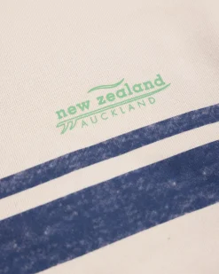 White sweater with light blue stripes